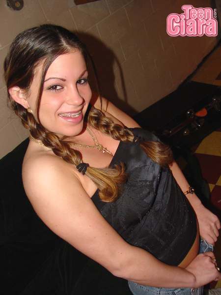 Teen Ciara unbuttoning jeans